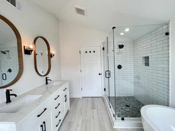 white-bathroom-remodel-with-his-and-her-sinks-1