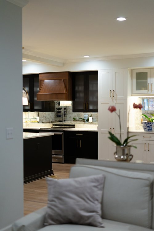 Kitchen remodel with wood hood vent