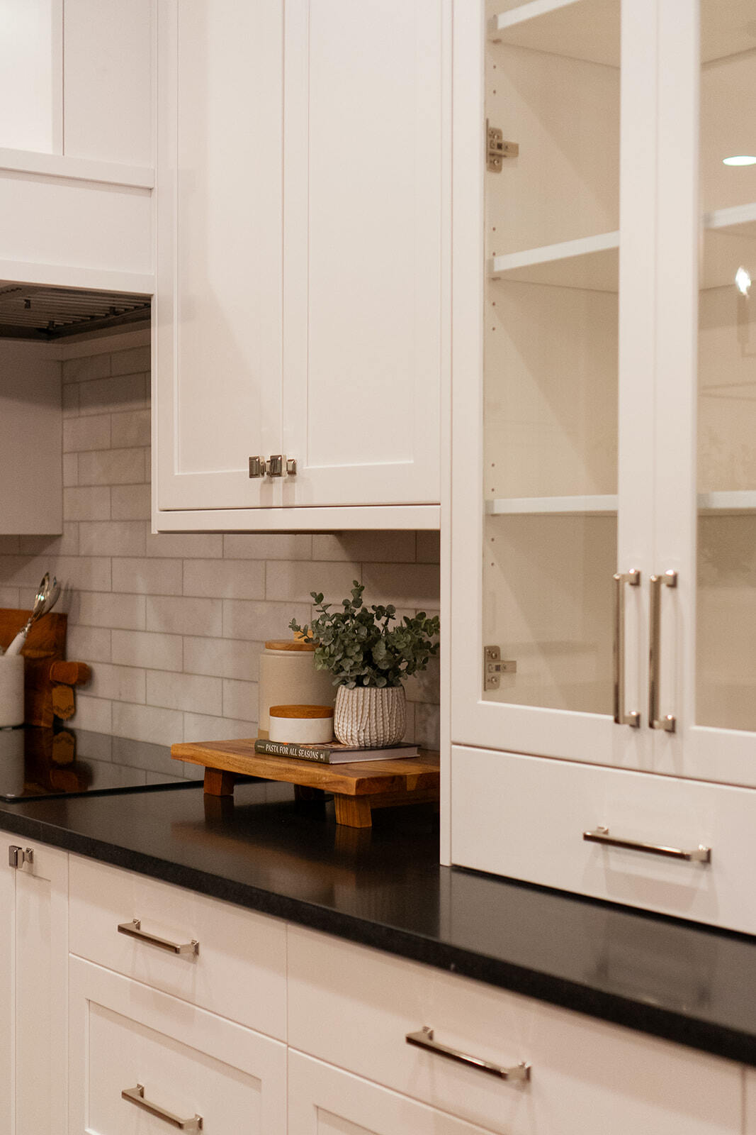 White kitchen cabinets with gold hardware