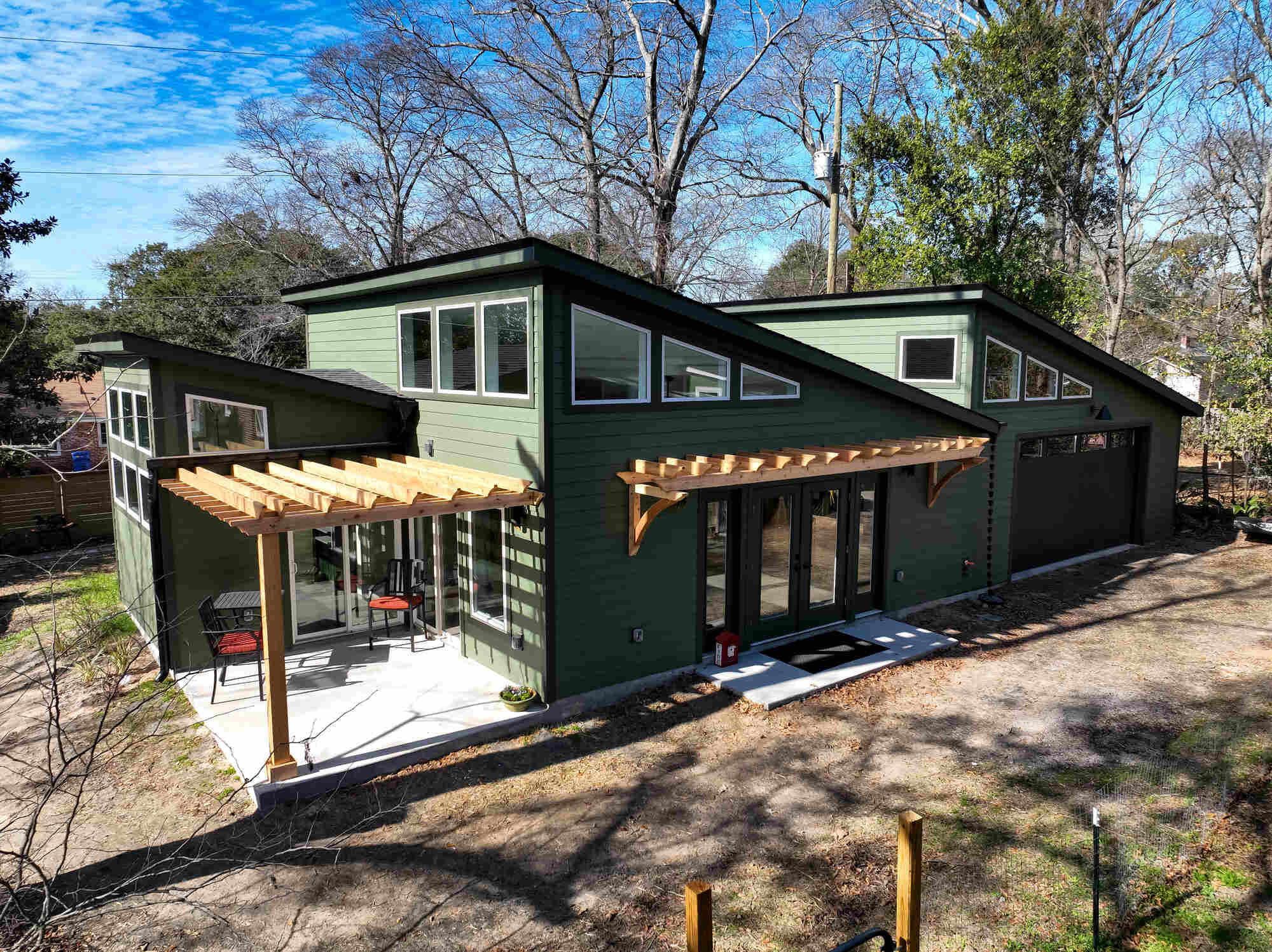 green-custom-home-with-covered-pergola-lexington-south-carolina