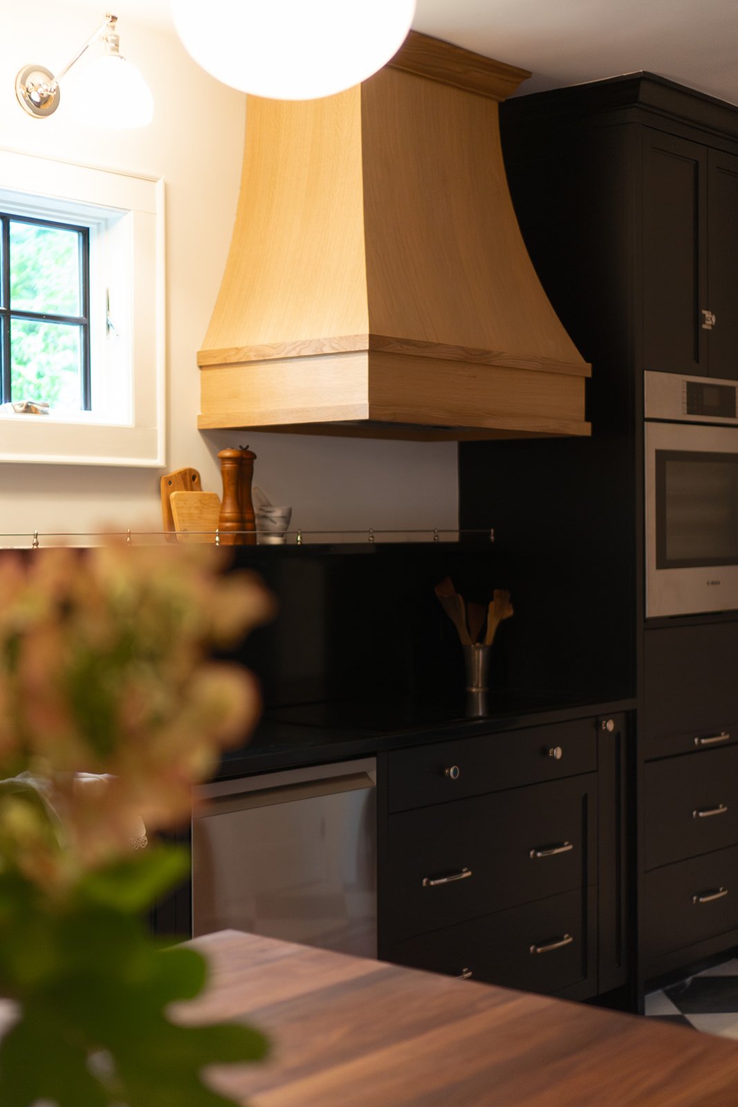 Wood range hood in kitchen remodel